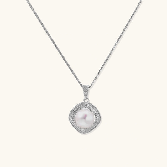 Cushion-shaped double halo pendant with 10mm freshwater pearl center on rhodium-plated sterling silver chain