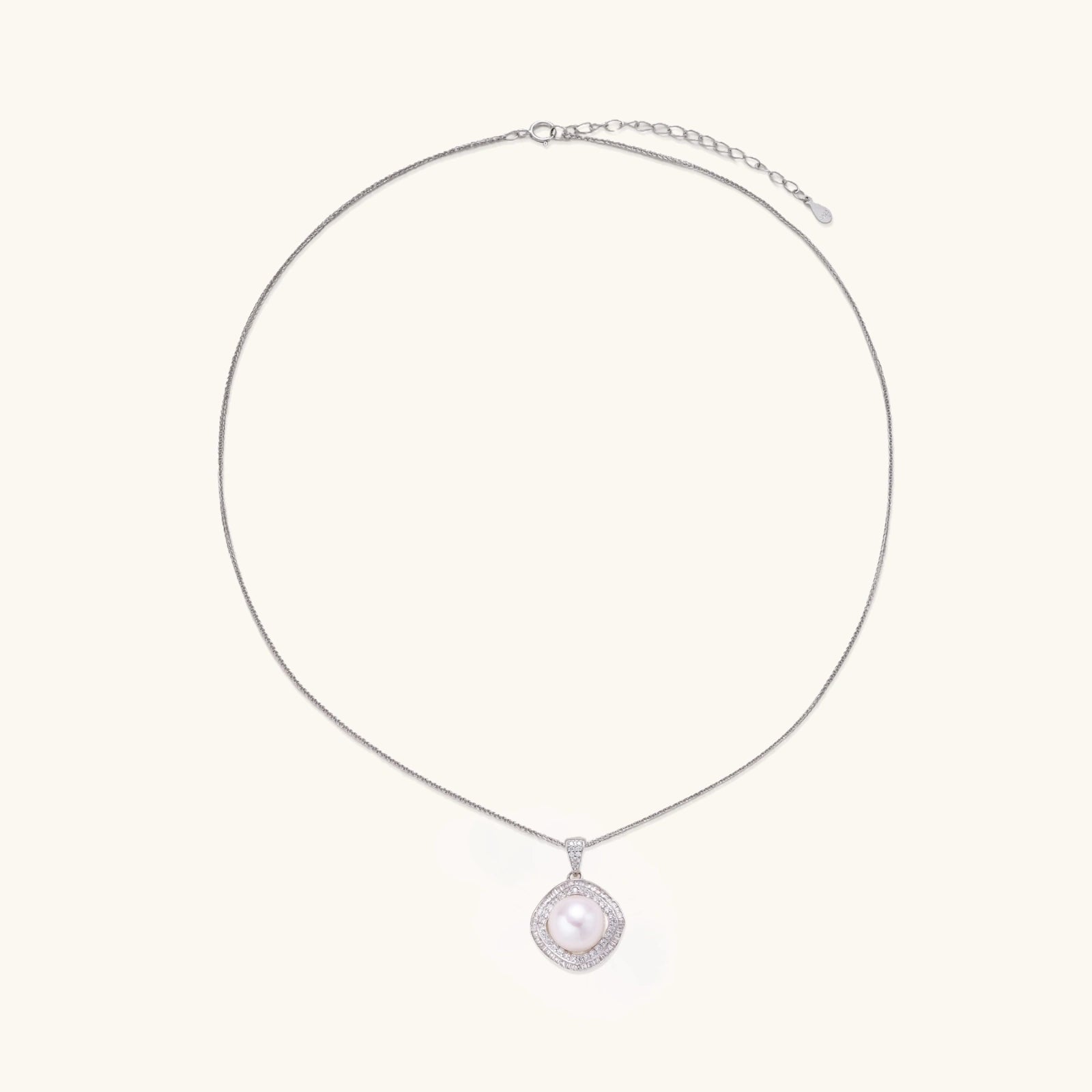 Cushion-shaped double halo pendant with 10mm freshwater pearl center on rhodium-plated sterling silver chain